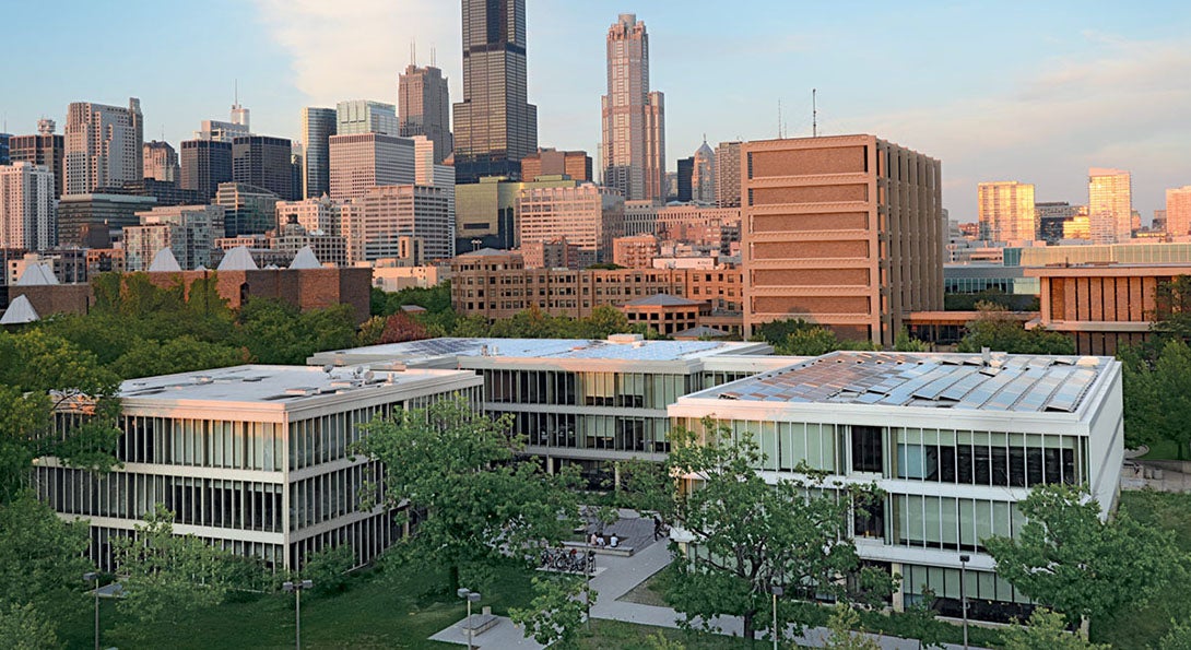 A view of the Chicago skyline, with Douglas Hall on the UIC campus in the foreground.
                  